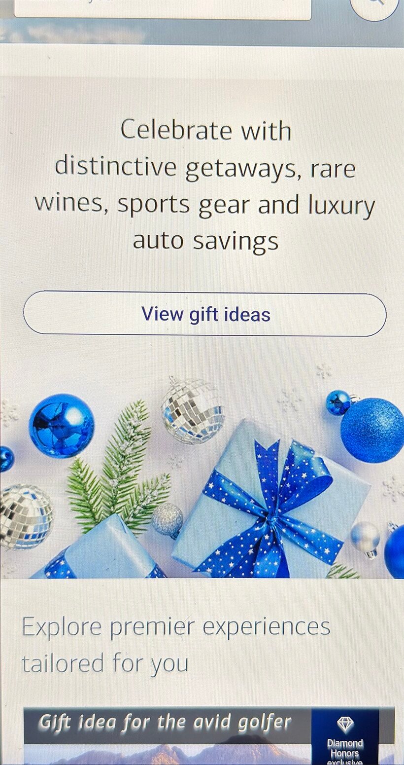 The holiday banner in place above the offer grid on a phone
